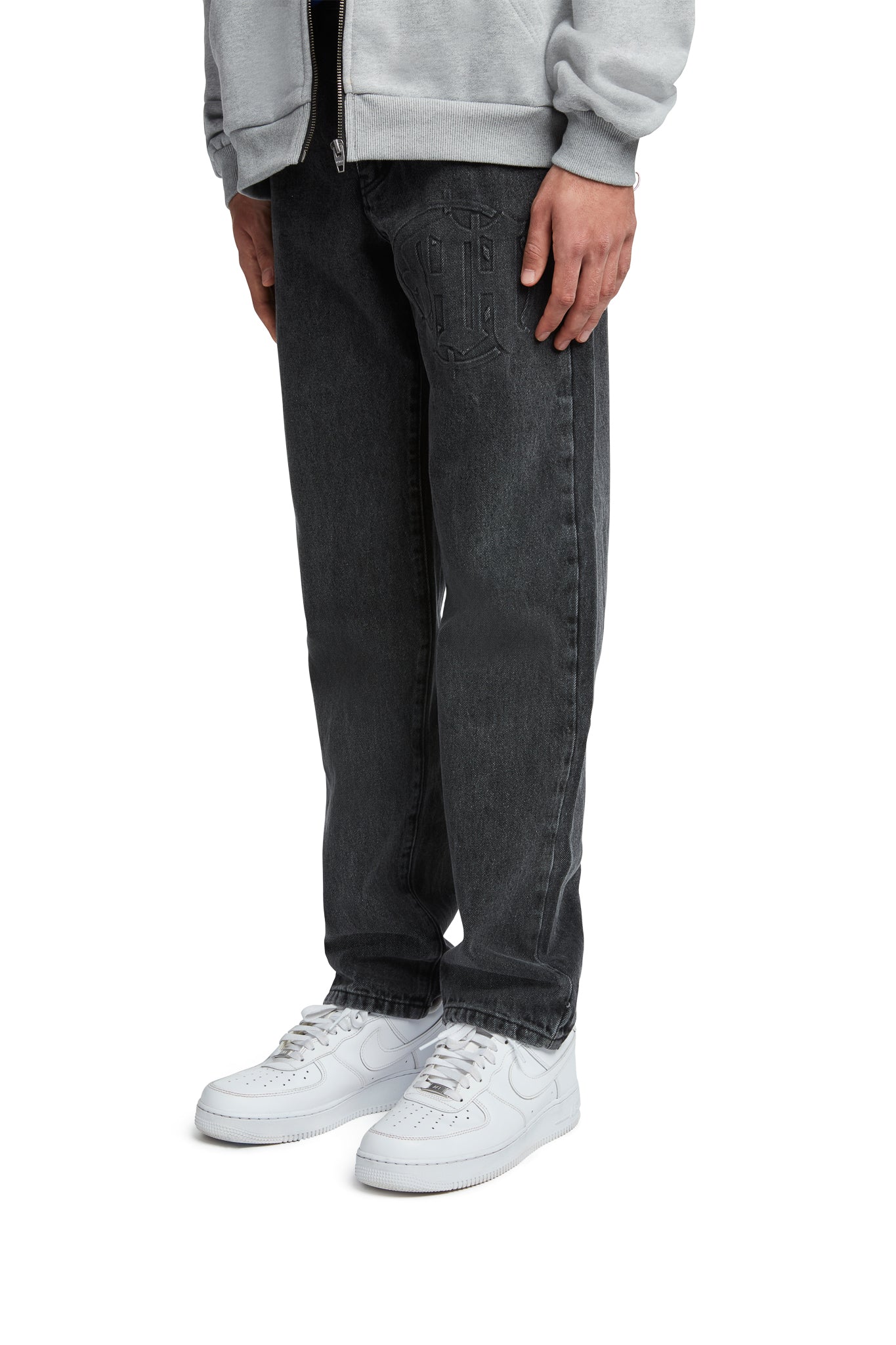 EMBOSSED TARGET LOGO DENIM PANTS by MENACE
