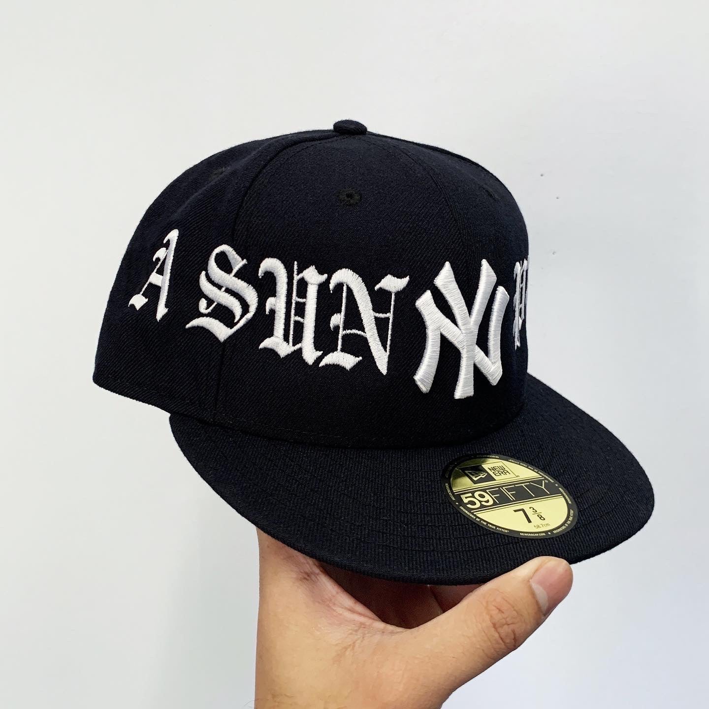 A SUNNY PLACE FOR SHADY PEOPLE FITTED CAP by MENACE