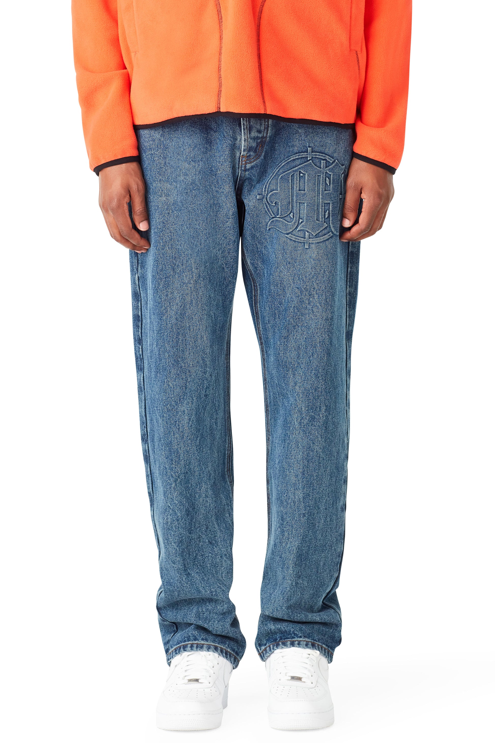 EMBOSSED TARGET LOGO DENIM PANTS by MENACE