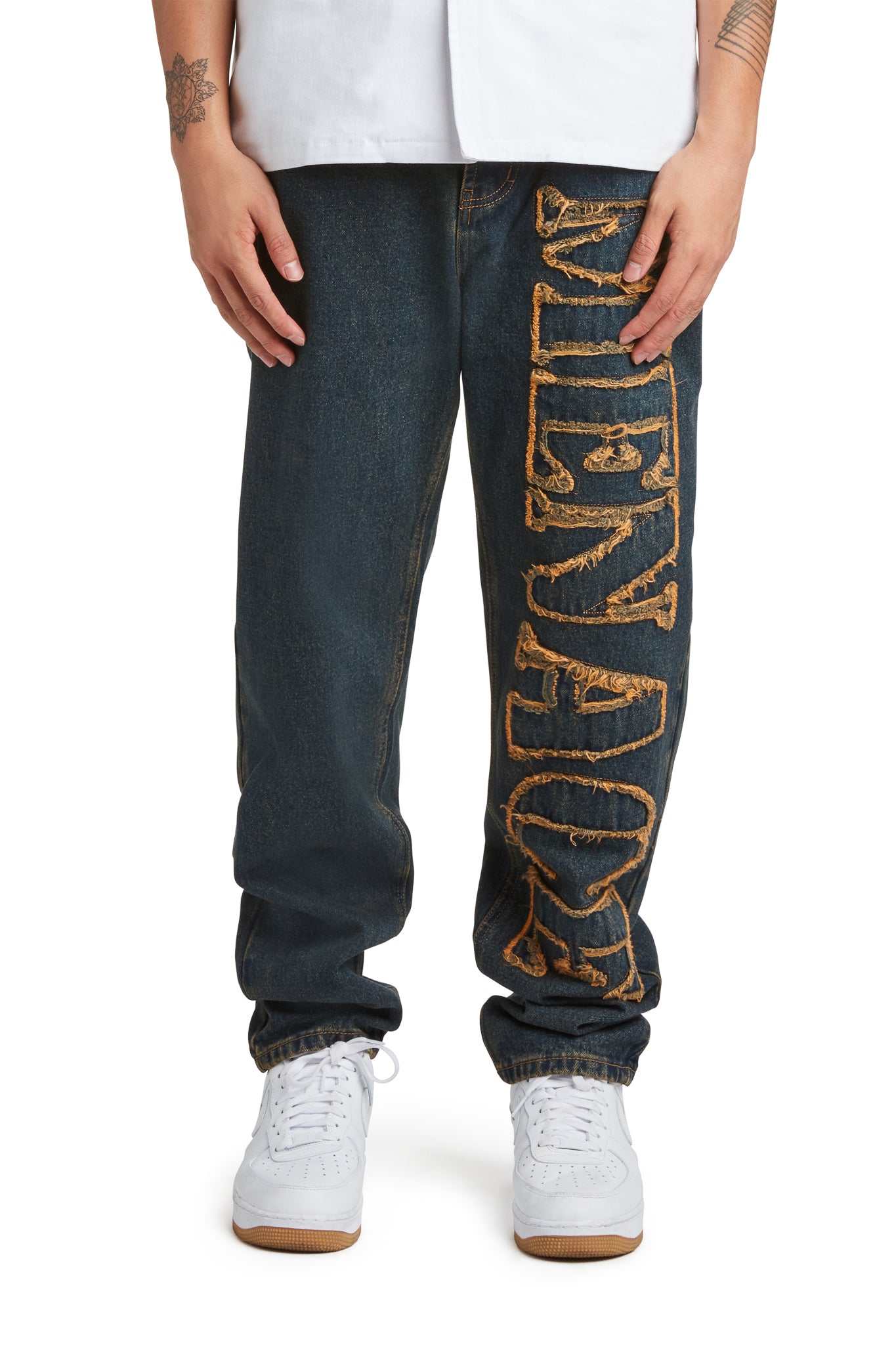 DISTRESSED STENCIL DENIM PANTS