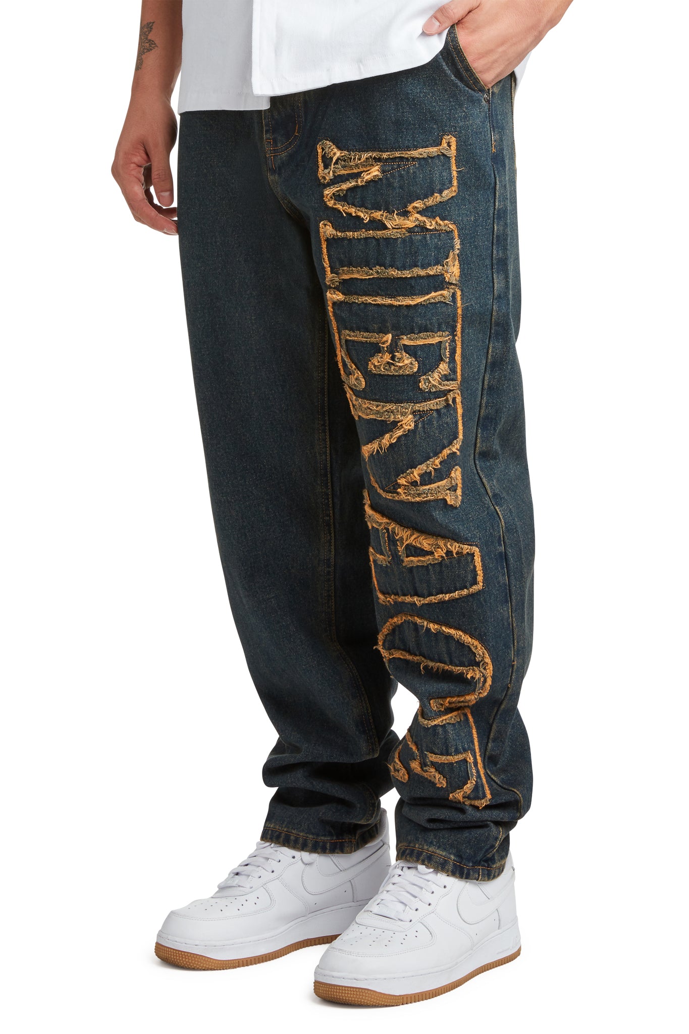 DISTRESSED STENCIL DENIM PANTS