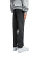 EMBOSSED TARGET LOGO DENIM PANTS by MENACE