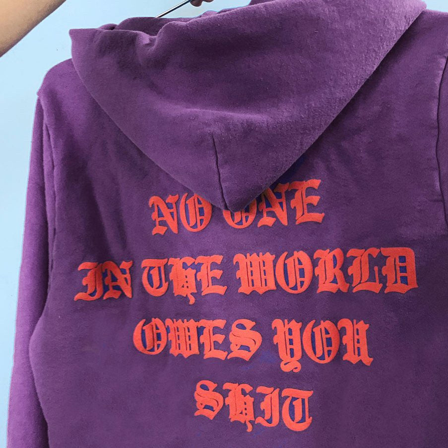 NO ONE IN THE WORLD OWES YOU SHIT ZIP-UP HOODIE by MENACE