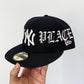 A SUNNY PLACE FOR SHADY PEOPLE FITTED CAP by MENACE
